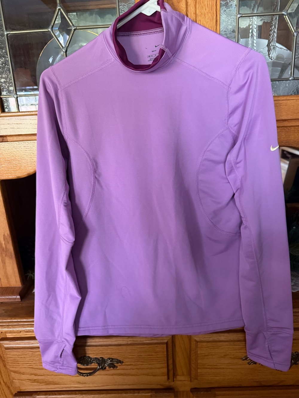 Ladies Nike cold gear top.  Size med